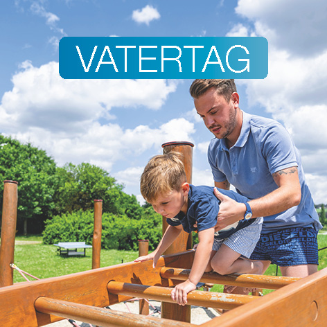 Mann hilft Kind beim Klettern und Aufschrift Vatertag